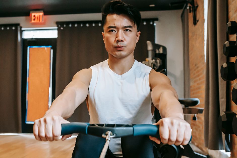 Compact home rowing machine set up in a living space